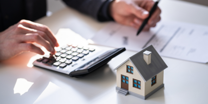 City of Roswell Proposes Property Tax Rate Increase to Address Critical City Needs Graphic shows a person with a calculator and a mimi house.