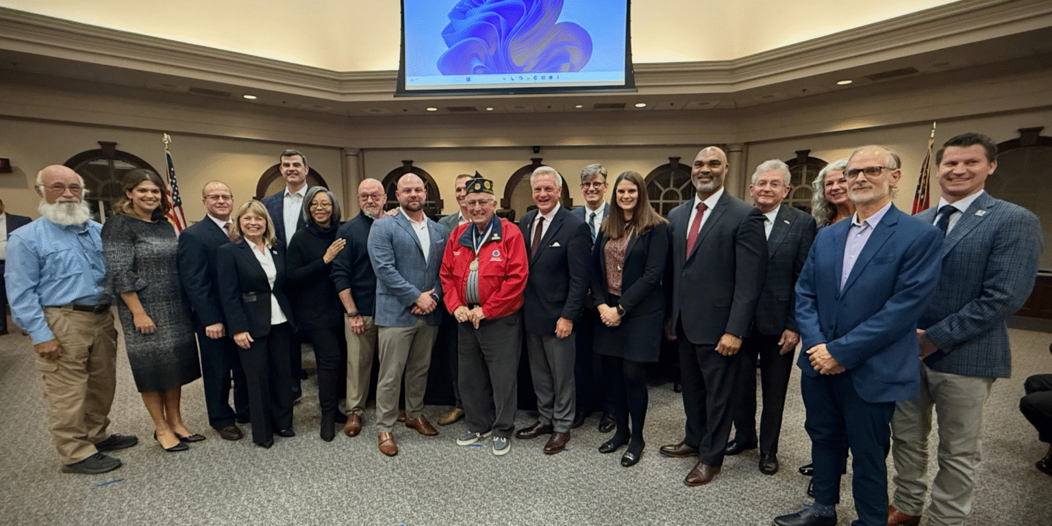 Mayor and Council celebrate the news with Roswell Veterans.